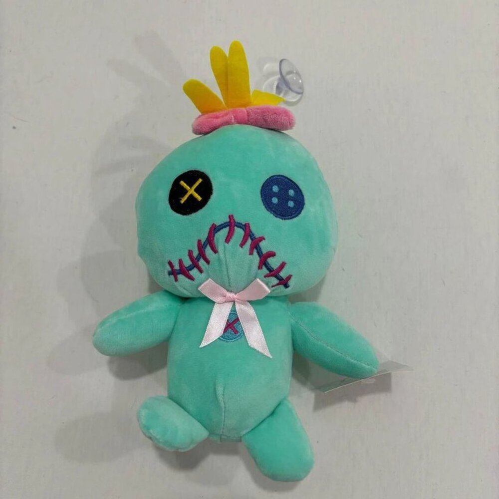 Green plush dolls